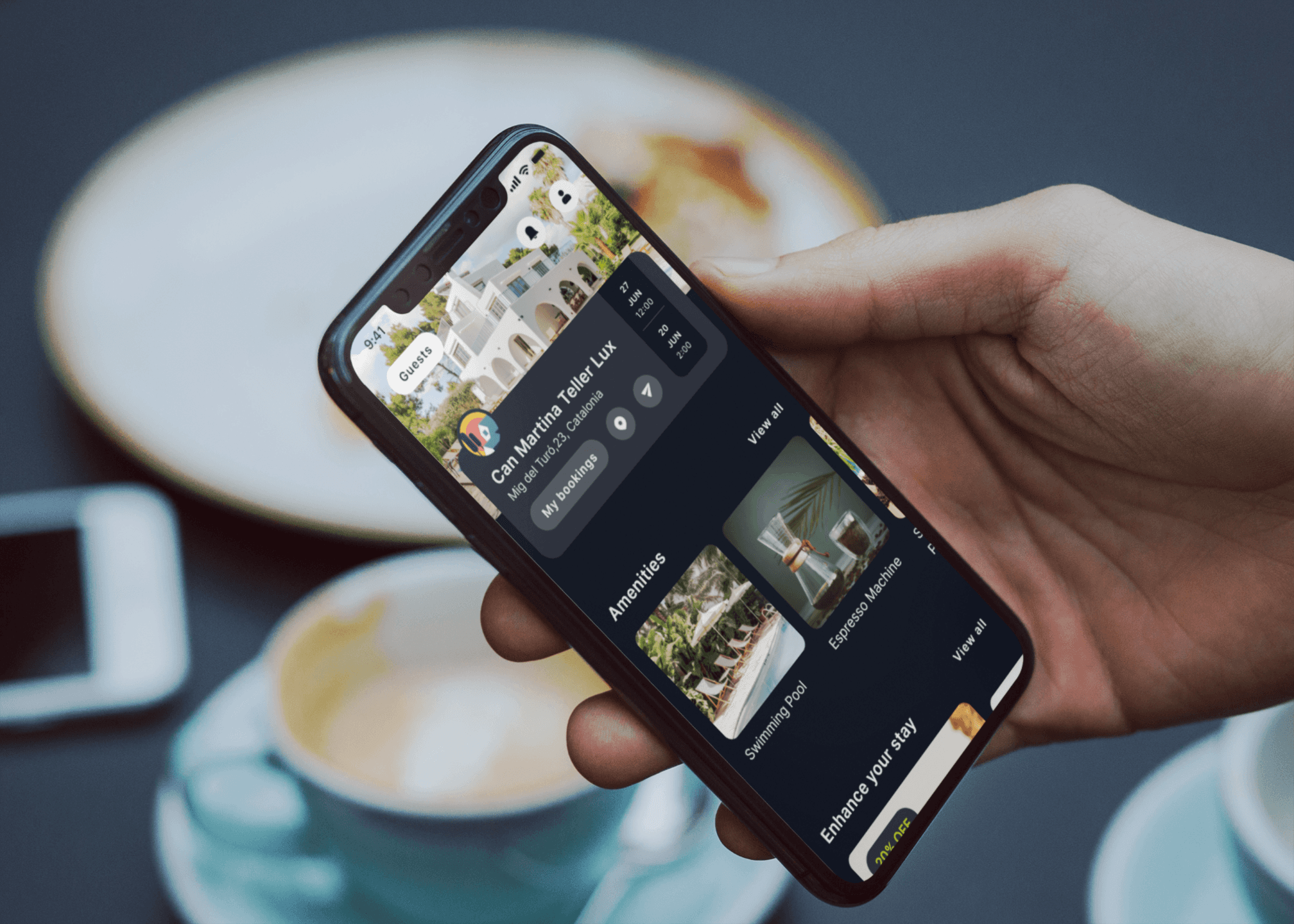 Holding a Phone  With  a Guest App Opened