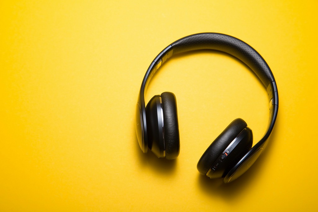 headphones in a yellow background