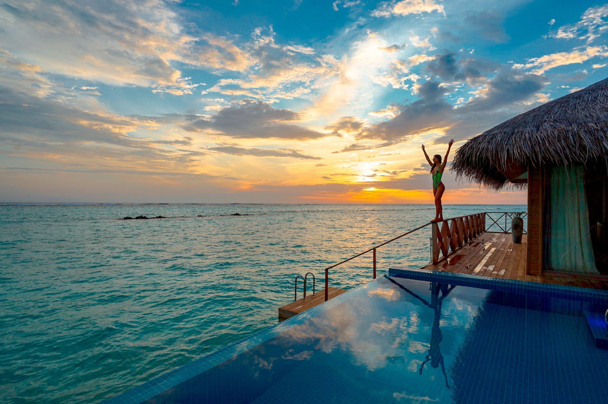  A Vacation Rental With a Pool and a Thatched Roof for an Elevated Guest Experience