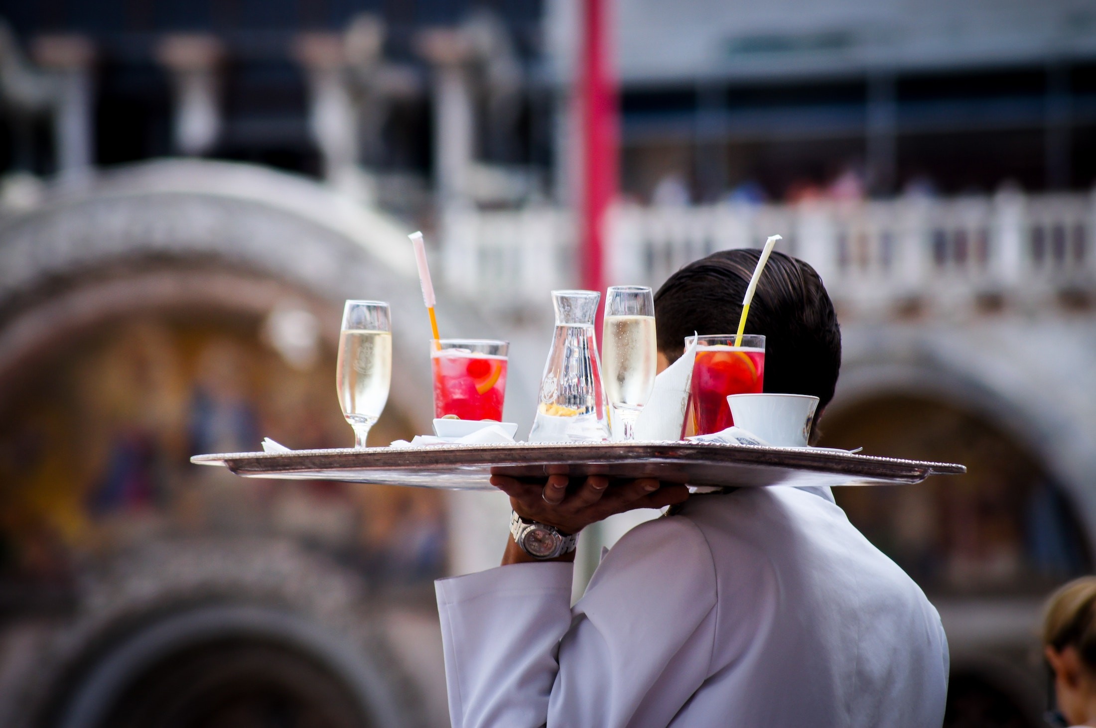 waiter carying drinks