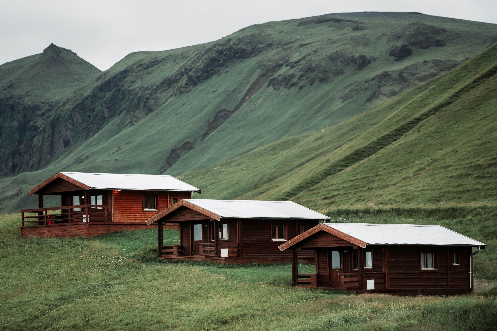 Three Guest House Rentals With Mountains in The Background